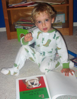 Isaac loves his new ABC Book.